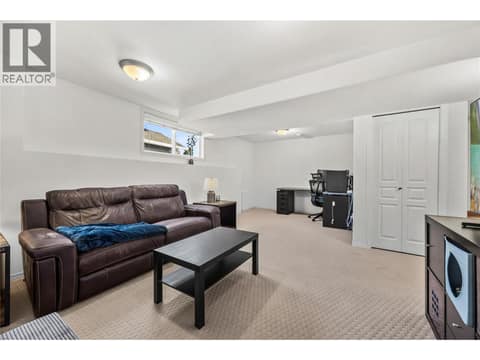 Main floor rec room attached to the 4th bedroom and full ensuite. at 2322 Shannon Heights Place, Shannon Lake, West Kelowna