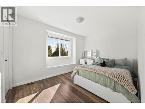 Second bedroom upstairs with lake and mountain views. at 2322 Shannon Heights Place, Shannon Lake, West Kelowna