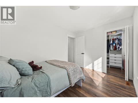 Second bedroom upstairs with lake and mountain views. at 2322 Shannon Heights Place, Shannon Lake, West Kelowna