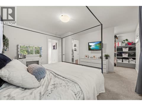 Primary king-ensuite with great views. Private and quiet. On a split plan from the other 2 bedrooms. Complete with oversized walk in closet and full ensuite. at 10724 Bottom Wood Lake Road Unit# 4, Lake Country South West