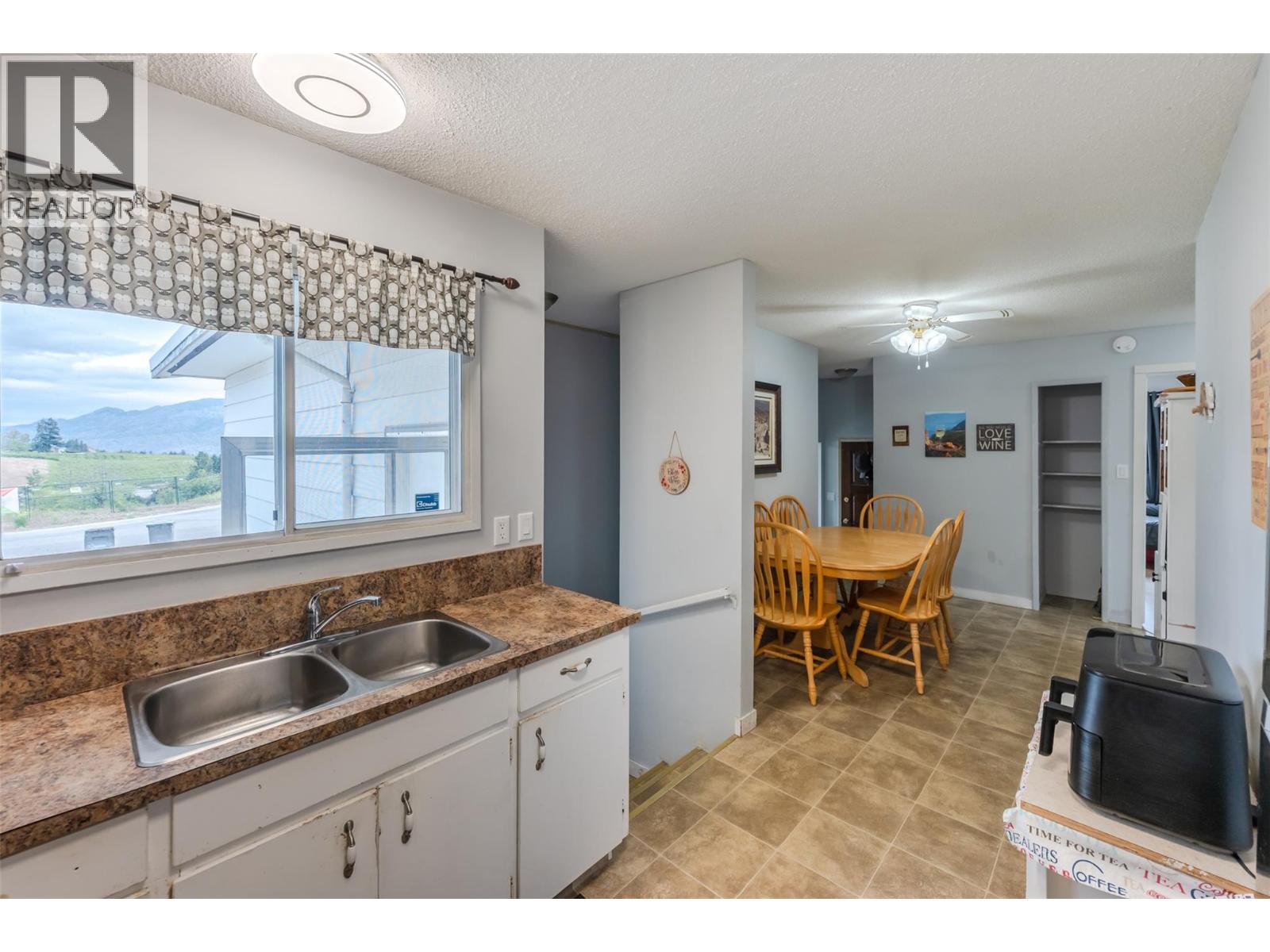 Photo 12 of 7503 HOWIS Crescent, Main Town, Summerland