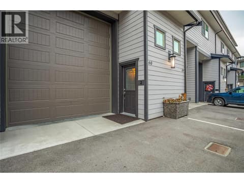 Front entrance. 2 covered and 2 uncovered parking spaces. at 3359 Cougar Road Unit# 60, Westbank Centre, West Kelowna