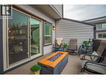 Large deck with natural gas hook up. The deck faces east so you get the morning sun but shade in the hot summer afternoon/evening. at 3359 Cougar Road Unit# 60, Westbank Centre, West Kelowna