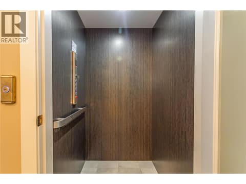 Large elevator servicing three levels. at 3359 Cougar Road Unit# 60, Westbank Centre, West Kelowna