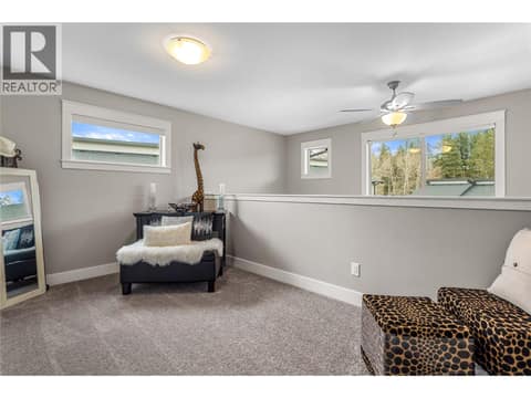 Loft could be used for play area, office or extra bedroom. at 3359 Cougar Road Unit# 60, Westbank Centre, West Kelowna