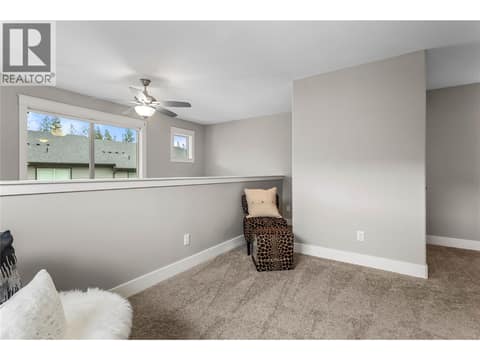 Loft could be used for play area, office or extra bedroom. at 3359 Cougar Road Unit# 60, Westbank Centre, West Kelowna