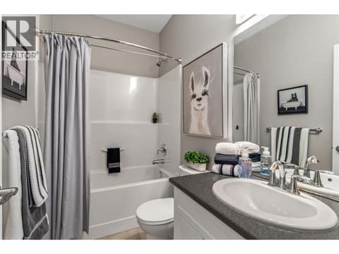 Main 4 piece bathroom on main floor. at 3359 Cougar Road Unit# 60, Westbank Centre, West Kelowna