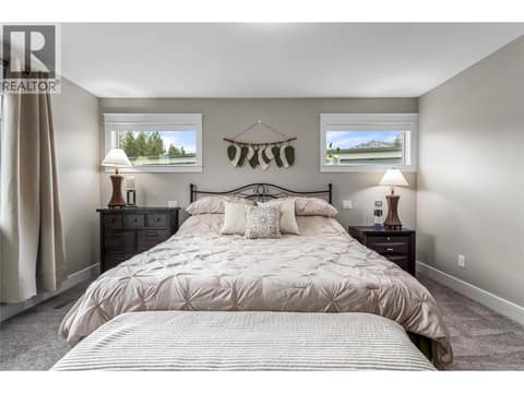Massive master suite with two walk in closets and luxurious ensuite. Top floor. at 3359 Cougar Road Unit# 60, Westbank Centre, West Kelowna