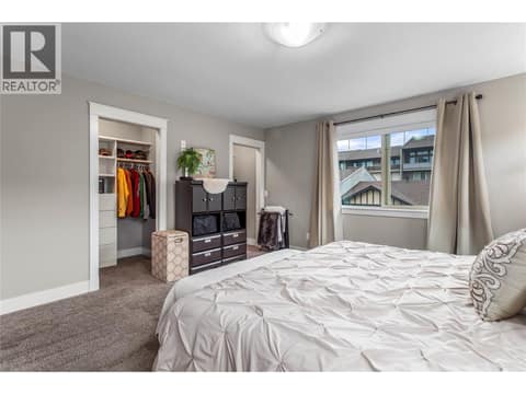 Massive master suite with two walk in closets and luxurious ensuite. Top floor. at 3359 Cougar Road Unit# 60, Westbank Centre, West Kelowna