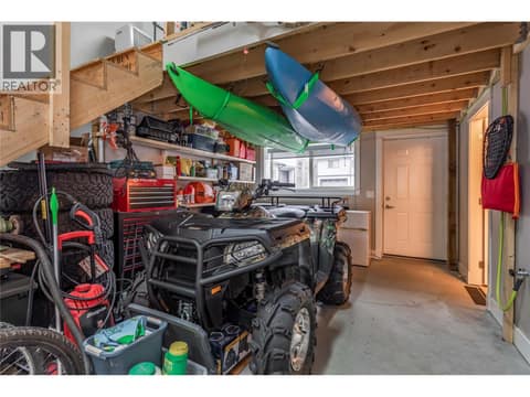 Mezzanine and third bathroom in back of garage. Lots of plugs. at 3359 Cougar Road Unit# 60, Westbank Centre, West Kelowna