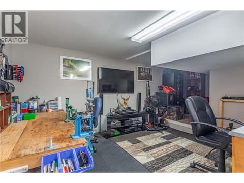 Mezzanine man cave with 6'8"" high ceilings so you can stand tall. at 3359 Cougar Road Unit# 60, Westbank Centre, West Kelowna