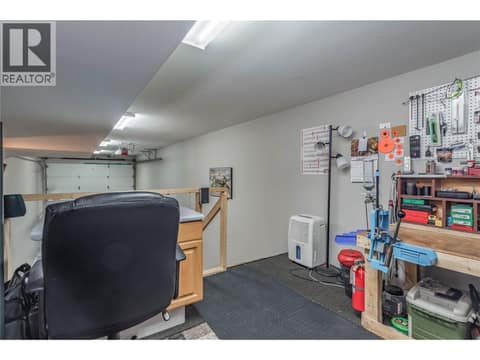 Mezzanine man cave with 6'8"" high ceilings so you can stand tall. at 3359 Cougar Road Unit# 60, Westbank Centre, West Kelowna