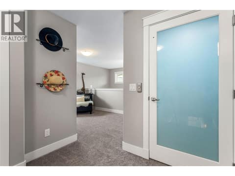 To loft and elevator on top floor. at 3359 Cougar Road Unit# 60, Westbank Centre, West Kelowna