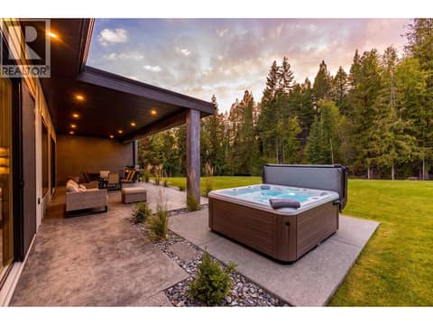 This image has been virtually staged to include Hot Tub at 7859 Boulter Road, North BX, Vernon