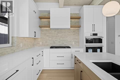 Same beautiful finishes and similar floor plan - photos shown are of 4499 Walker Road at 440 Eldorado Road, Lower Mission, Kelowna