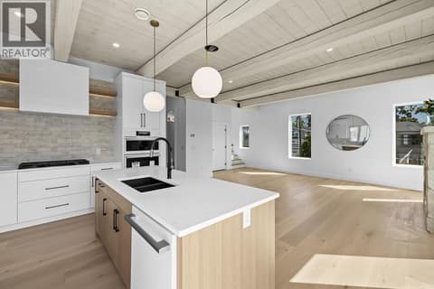 Same beautiful finishes and similar floor plan - photos shown are of 4499 Walker Road at 440 Eldorado Road, Lower Mission, Kelowna