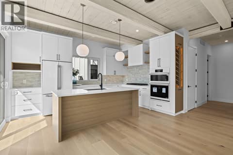 Same beautiful finishes and similar floor plan - photos shown are of 4499 Walker Road at 440 Eldorado Road, Lower Mission, Kelowna