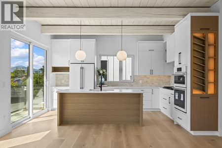 Same beautiful finishes and similar floor plan - photos shown are of 4499 Walker Road at 440 Eldorado Road, Lower Mission, Kelowna