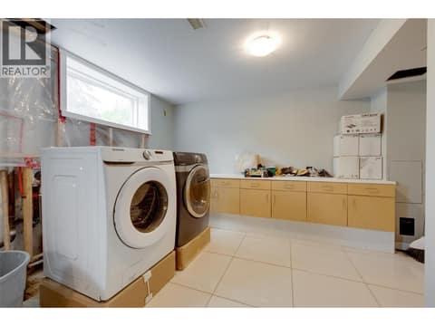 Laundry down. Would have to add a laundry up if you want to suite it. at 2350 Thacker Drive, Lakeview Heights, West Kelowna