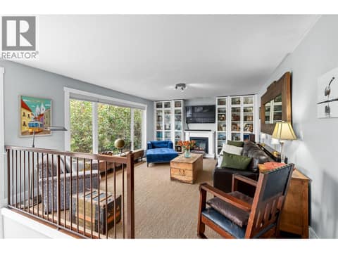 Living room to the left as you enter at 2350 Thacker Drive, Lakeview Heights, West Kelowna