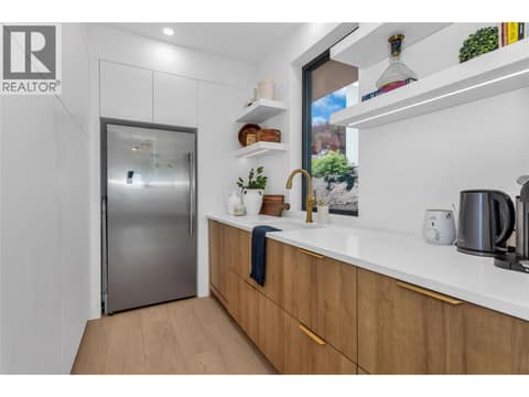 Butler pantry will full-sized freezer. at 9783 Centrestone Drive, Lake Country North West