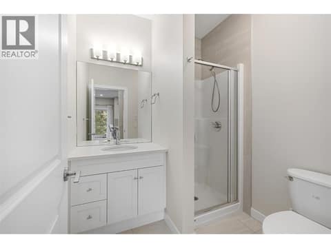 Full bathroom on the main floor at 695 Concordia Street, University District, Kelowna