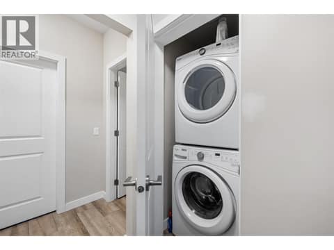 Full laundry in the legal suite at 695 Concordia Street, University District, Kelowna
