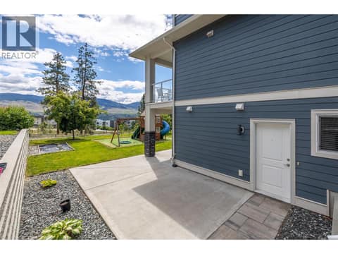 Legal suite access from north side of the home at 695 Concordia Street, University District, Kelowna