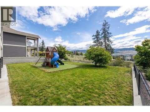 Pool size fully fenced yard at 695 Concordia Street, University District, Kelowna