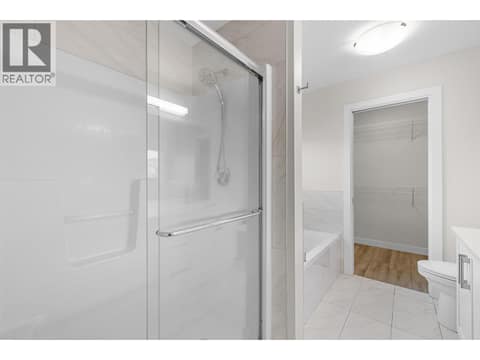 Shower and tub at 695 Concordia Street, University District, Kelowna