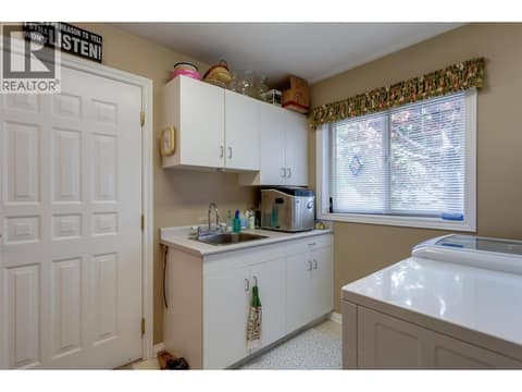 Laundry mud room to the garage at 4074 Gellatly Road Unit# 221, Westbank Centre, West Kelowna