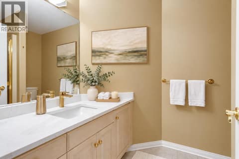 Main floor bathroom with a shower at 4074 Gellatly Road Unit# 221, Westbank Centre, West Kelowna