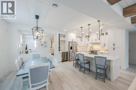 Dining room & kitchen at 2450 Radio Tower Road Unit# 58, Oliver Rural