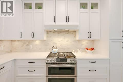 Gas stove, custom hood range at 2450 Radio Tower Road Unit# 58, Oliver Rural