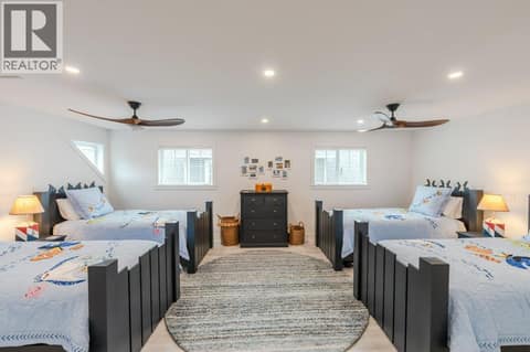 Huge oversized bedroom with 4 beds at 2450 Radio Tower Road Unit# 58, Oliver Rural