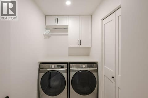 Laundry room main level at 2450 Radio Tower Road Unit# 58, Oliver Rural