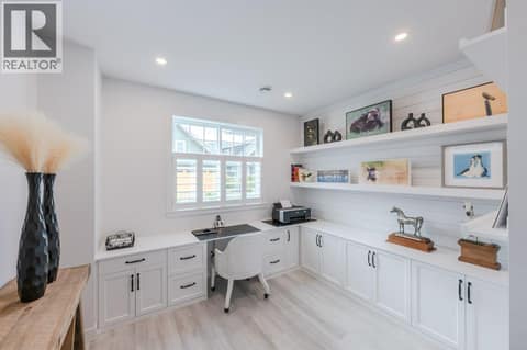Main level office with built-in desk at 2450 Radio Tower Road Unit# 58, Oliver Rural