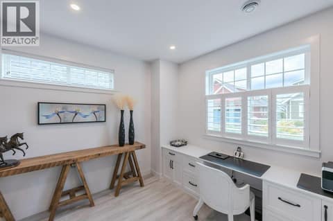 Main level office with built-in desk at 2450 Radio Tower Road Unit# 58, Oliver Rural
