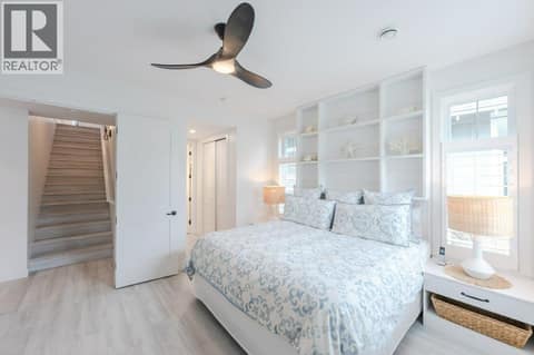 Primary bedroom with built-ins at 2450 Radio Tower Road Unit# 58, Oliver Rural