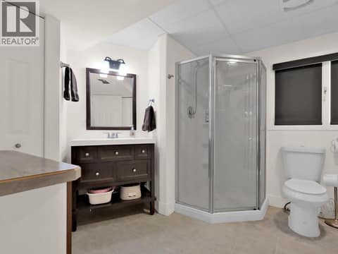 1 of two bathrooms on lower level. (has laundry) at 2630 Rufli Road, Westbank Centre, West Kelowna