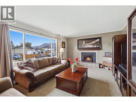 Living Room with Fireplace at 723 Moody Place, Brocklehurst, Kamloops
