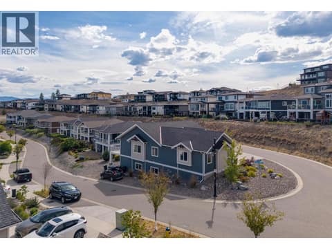 Tenants park on rocks along the road at 741 Yorkville Street, University District, Kelowna