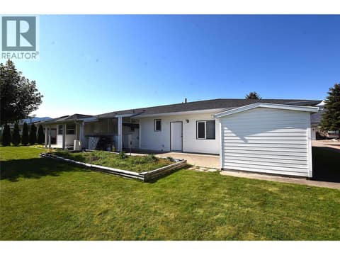 Back view of the home at 415 4 Street, Swan Lake West, Vernon