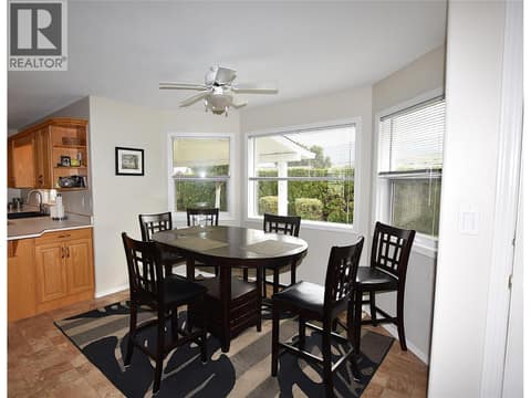 Big windows near the dining area at 415 4 Street, Swan Lake West, Vernon