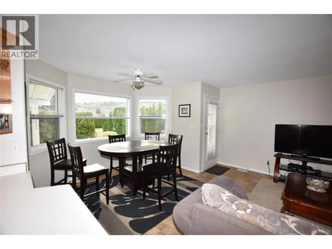 Door out to the patio for ease of BBQing at 415 4 Street, Swan Lake West, Vernon