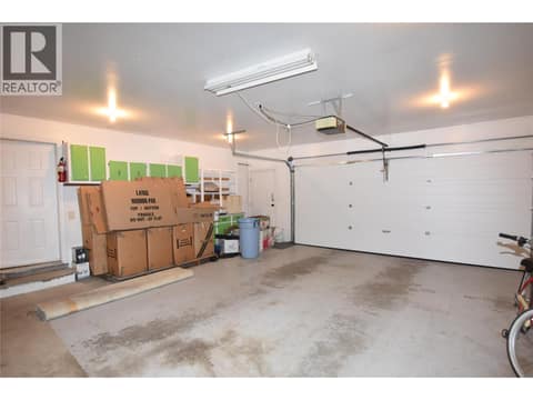 Newer garage door at 415 4 Street, Swan Lake West, Vernon