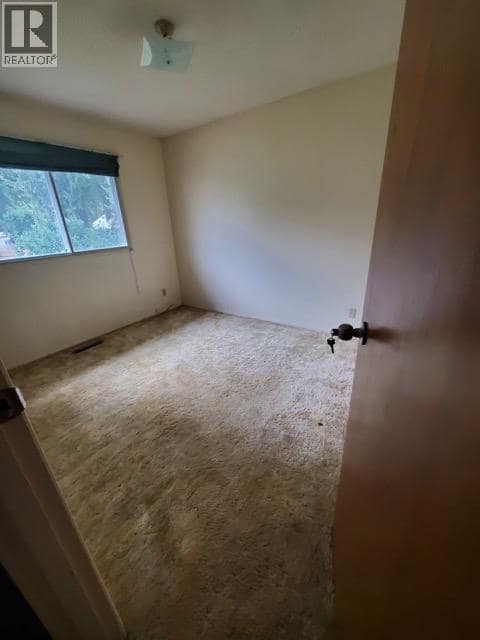 Upstairs second bedroom - photo taken 2023 at 683 Downie Road, South BX, Vernon