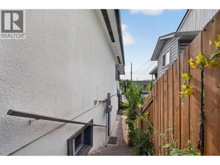 Side access from front to back yard at 3302 Pleasant Valley Road, East Hill, Vernon