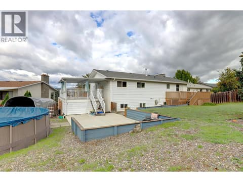 Above ground pool in back yard at 5723 Richards Crescent, North BX, Vernon