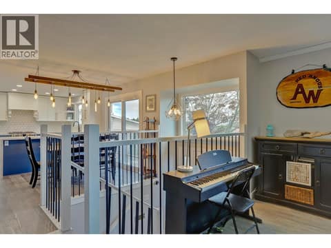 From Kitchen and dining into living room at 5723 Richards Crescent, North BX, Vernon
